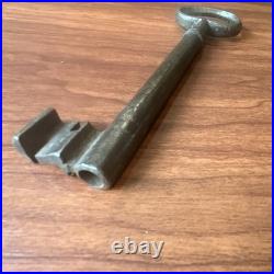 Large antique metal skeleton key with oval bow, old-style vintage key