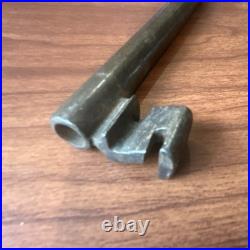 Large antique metal skeleton key with oval bow, old-style vintage key