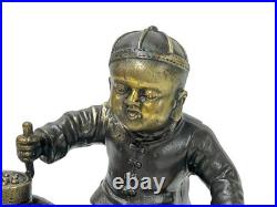 Vintage Bronze Color Metal Old Style Dressing Kid Grinding Pose Statue ws4742