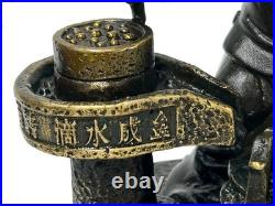 Vintage Bronze Color Metal Old Style Dressing Kid Grinding Pose Statue ws4742