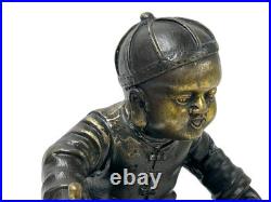 Vintage Bronze Color Metal Old Style Dressing Kid Grinding Pose Statue ws4742